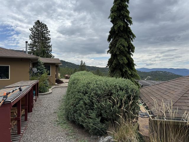 Okanagan hillside property being assessed for landscaping work